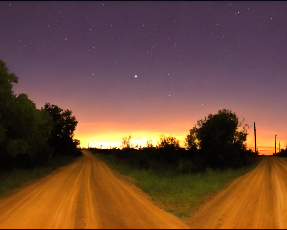 Twilight dirt road under starry sky and orange dusk horizon