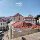 Panoramic view of Lisbon's historic buildings with terracotta roofs