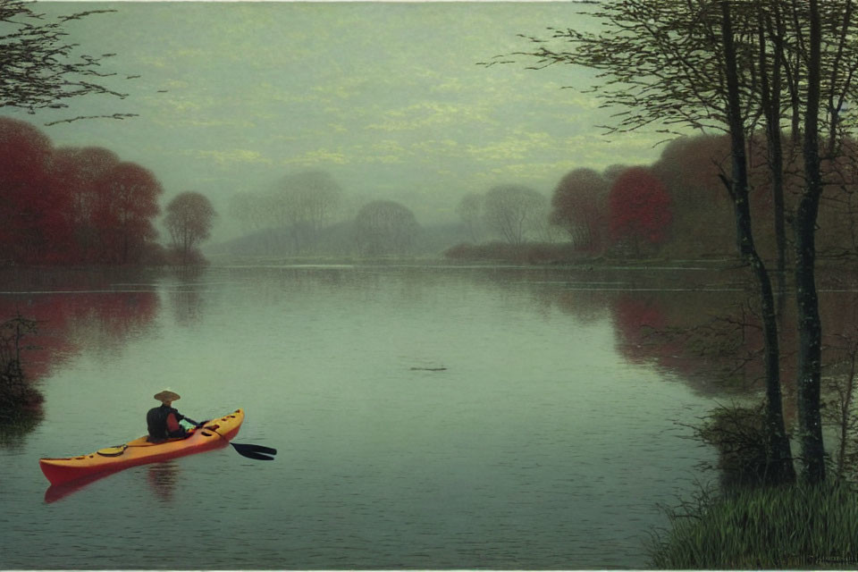 Yellow kayak paddler on tranquil lake with misty trees