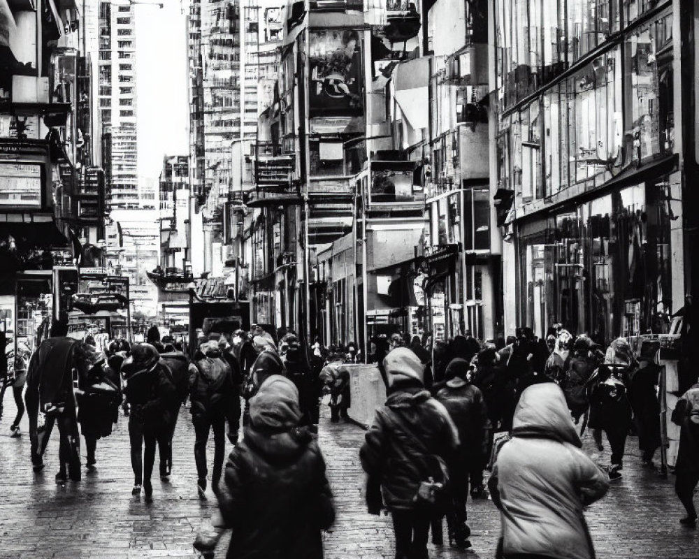 Monochrome city street with pedestrians and high-rise buildings