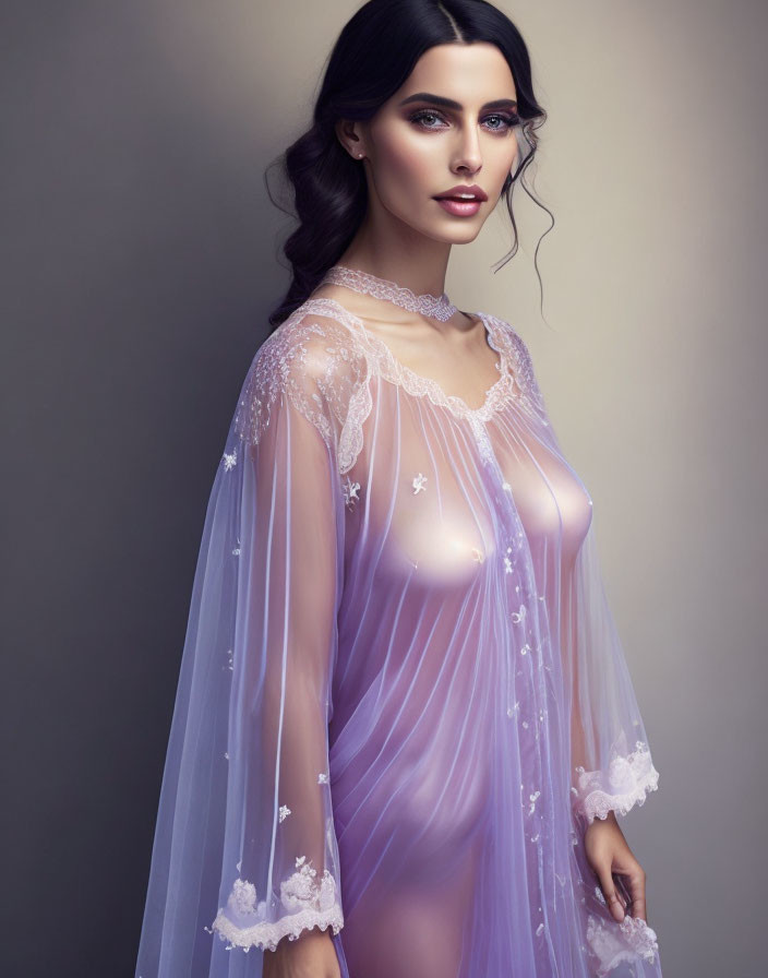 Dark-haired woman in sheer purple gown against neutral backdrop