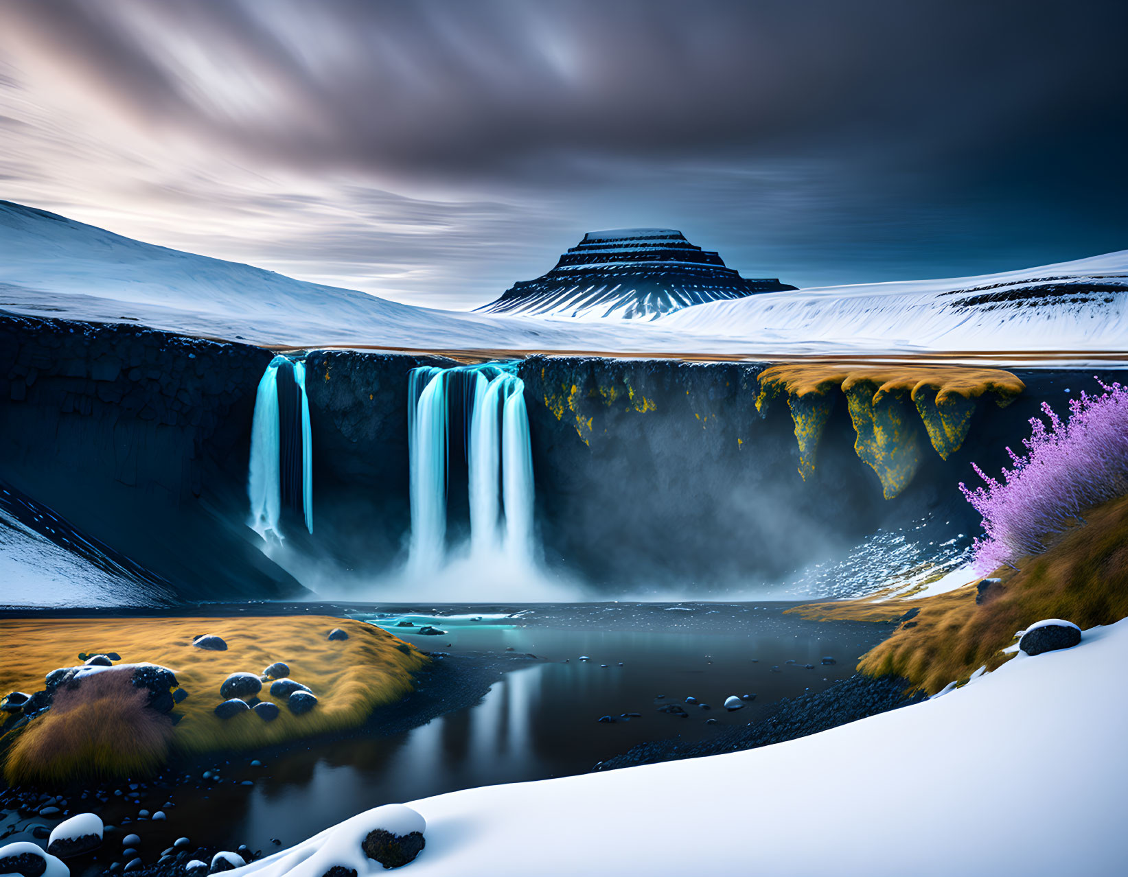 Majestic waterfall in a dramatic landscape with tiered mountain