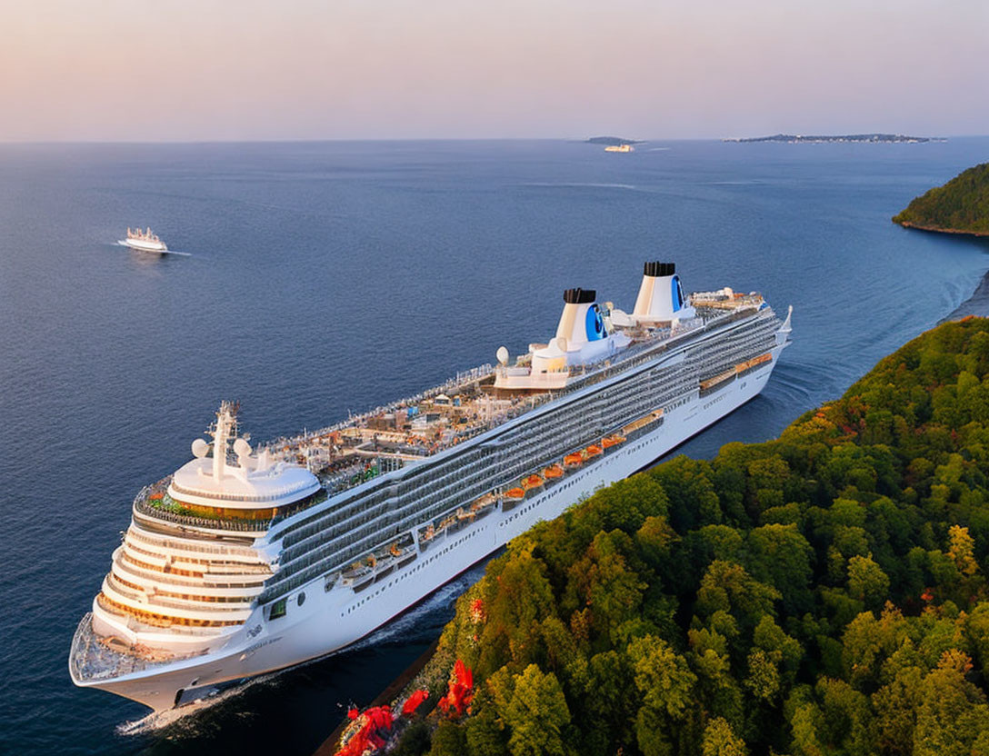 Cruise ship near autumn trees on lush coastline