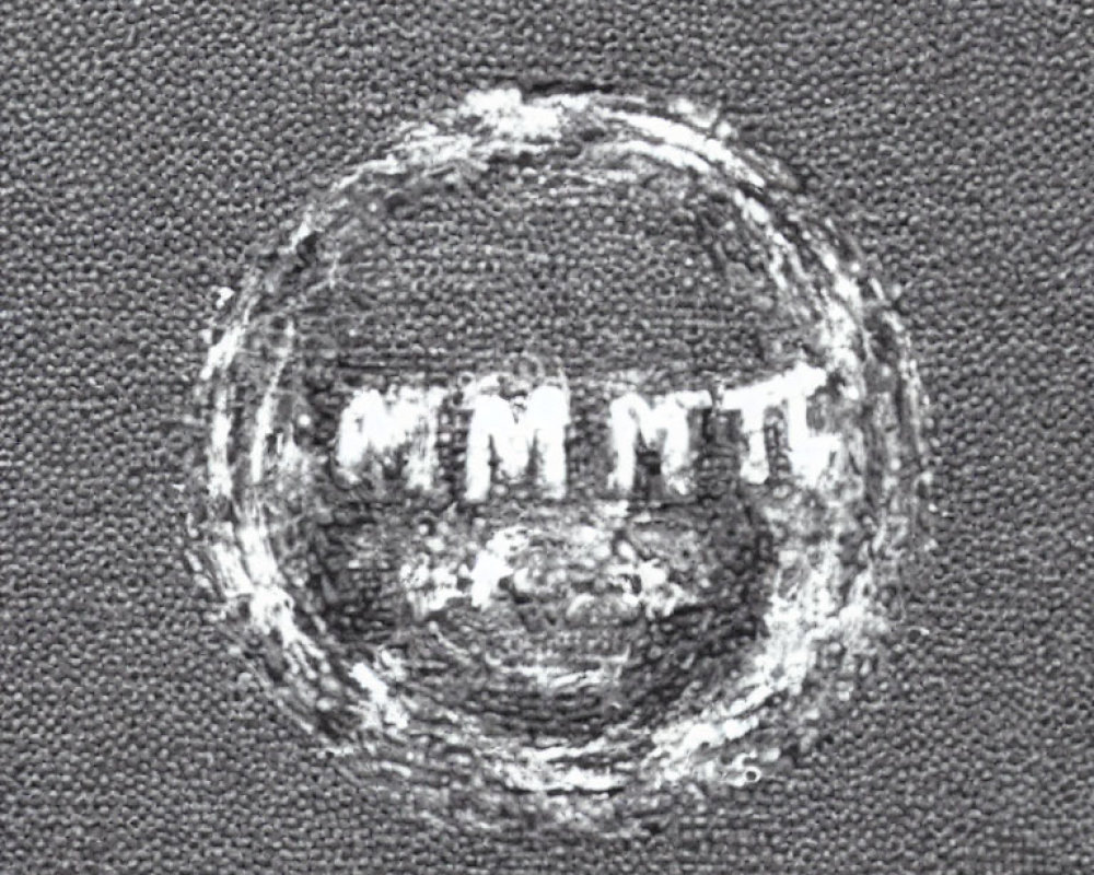 Circular White Logo with "MMT" Text on Grey Background