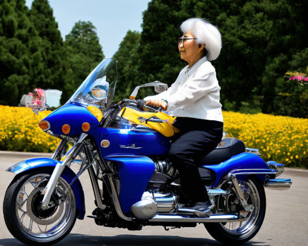 Elderly Woman on Blue Motorcycle Surrounded by Nature