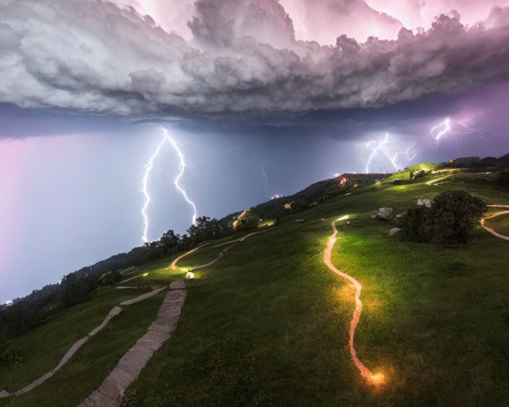 Dramatic thunderstorm with multiple lightning strikes over lush green hillside path at dusk