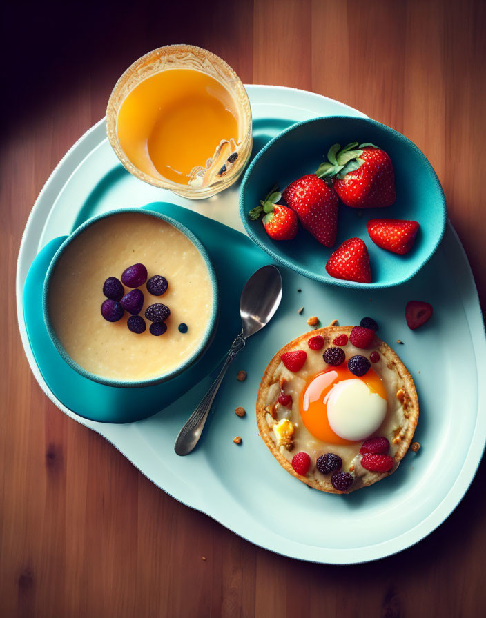 Nutritious Breakfast Spread with Oatmeal, Berries, Egg on Toast, and Orange Juice