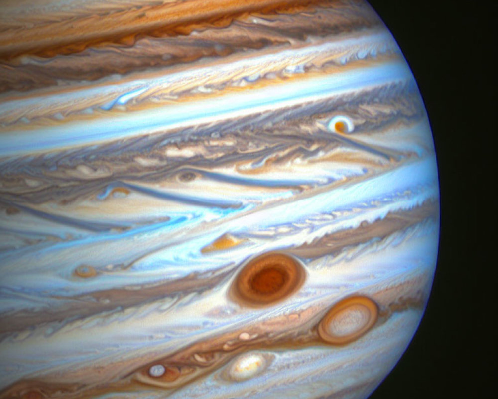 Detailed view of swirling gas clouds and storms on Jupiter.