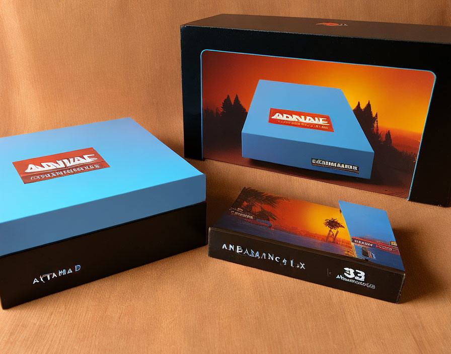 Sunset graphic design on custom-printed product boxes on wooden surface