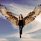 Digital artwork: Woman with intricate wings in sky with soft clouds