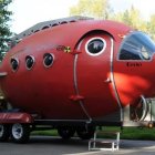 Steampunk submarine near waterfall and treehouse