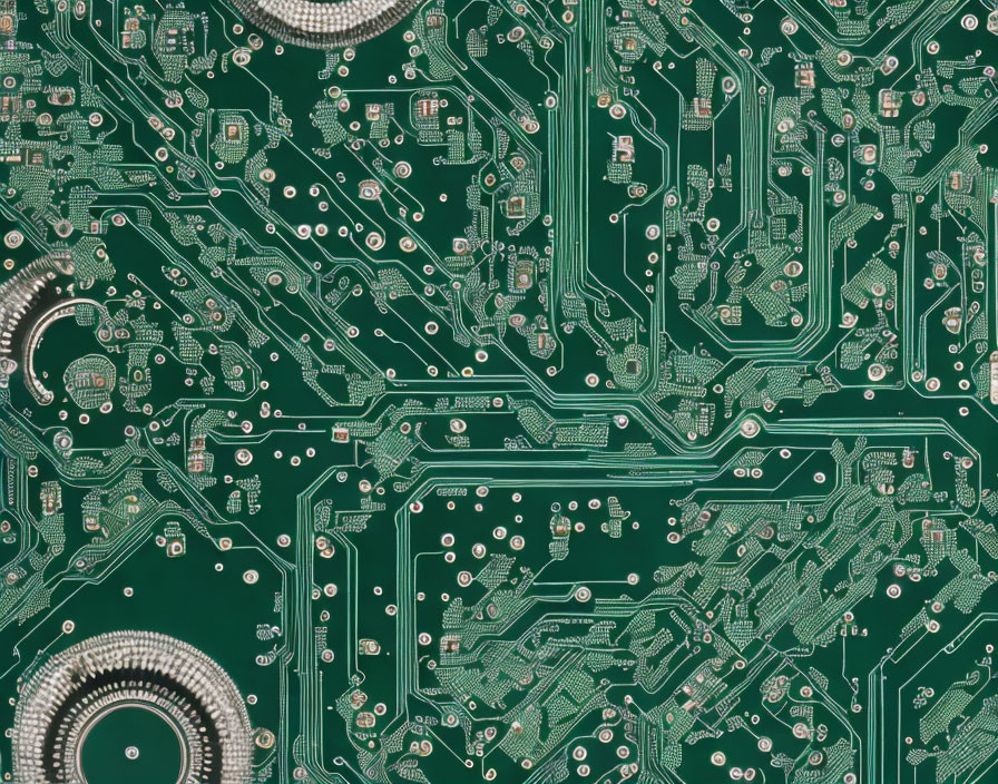 Detailed Green Circuit Board with Metallic Traces and Electronic Pathways