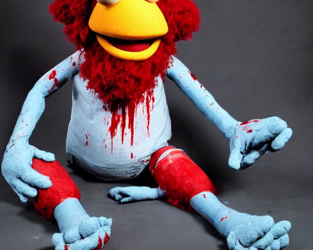 Disheveled Elmo Plush Toy Sitting Position