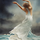 Woman in flowing white dress standing on water under dramatic sunset sky