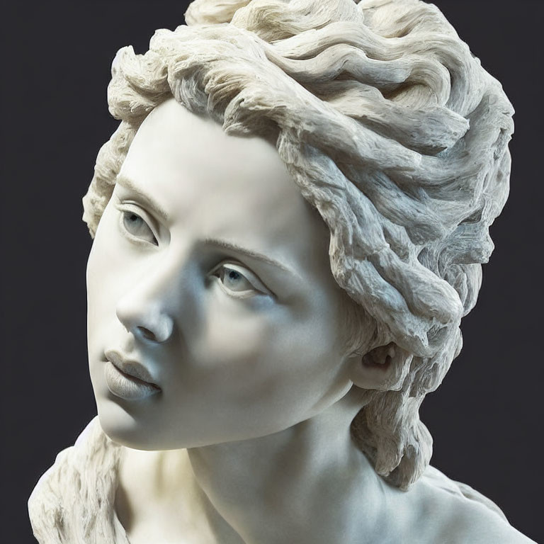 Detailed sculpture of a woman's head with expressive eyes and wavy hair