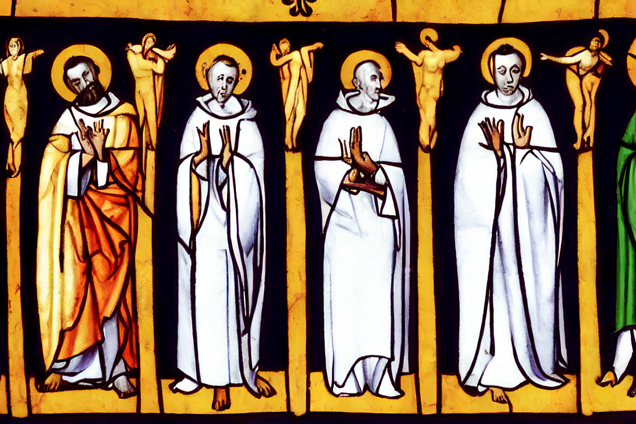 Gothic stained glass window with four saintly figures in halos and robes