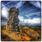 Vintage Attired Trio Admire Surreal Landscape with Moon