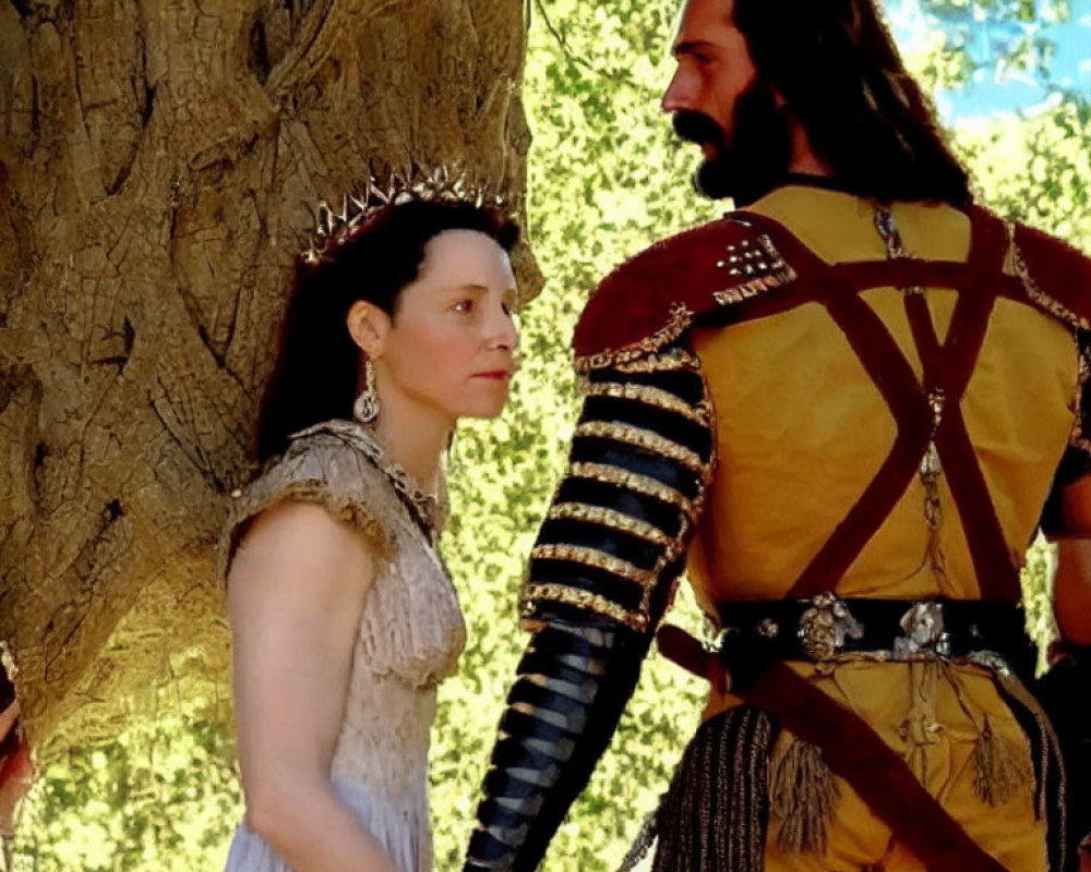 Woman in white dress and crown meets medieval warrior under tree in captivating gaze exchange