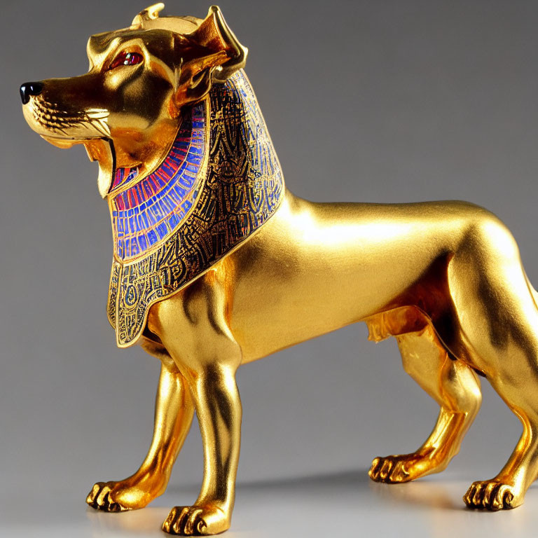 Golden dog figurine with Egyptian-style collar: regal and mythical.