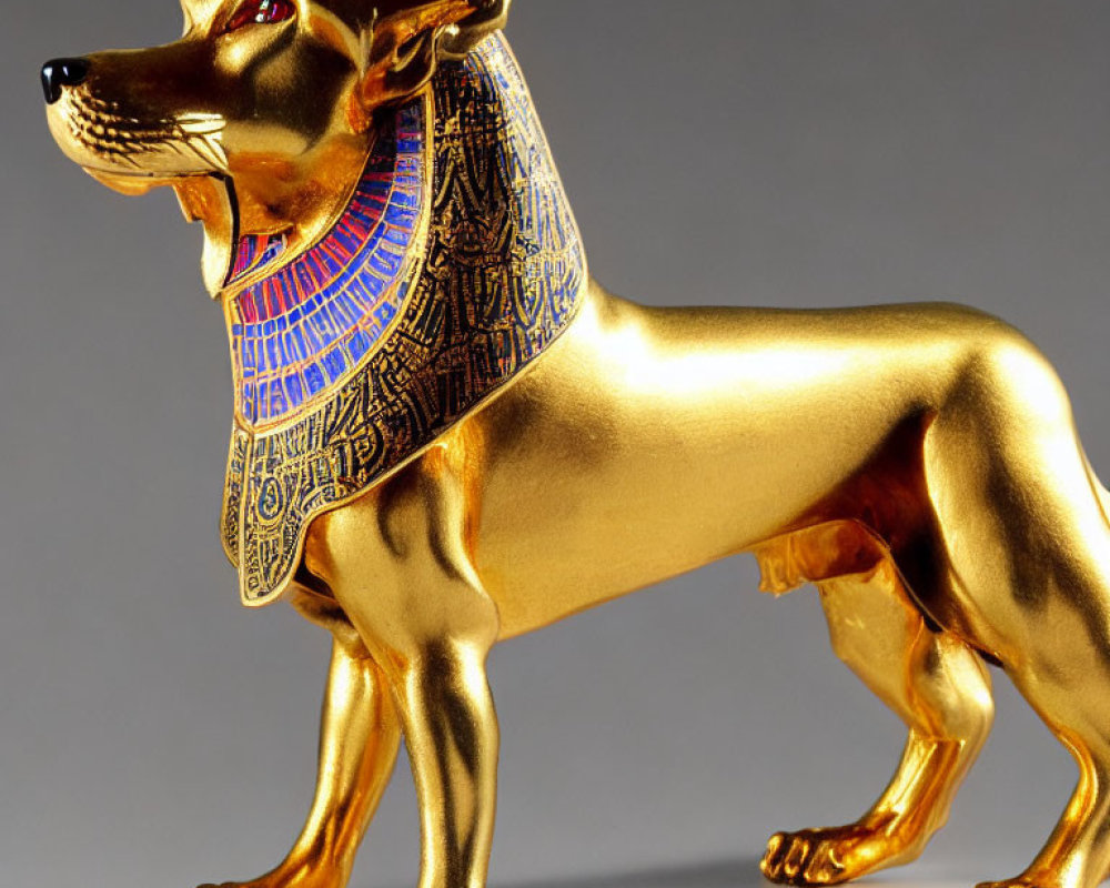 Golden dog figurine with Egyptian-style collar: regal and mythical.