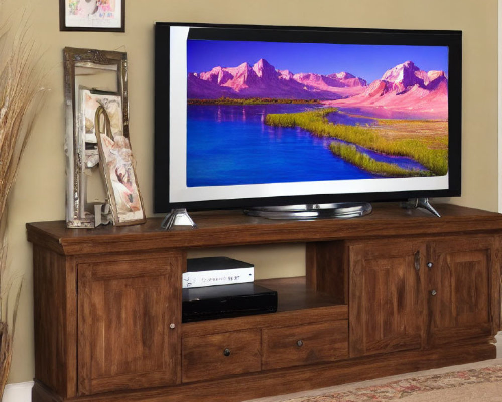 Flat-Screen TV on Wooden Console with Cabinets and Photo Frame