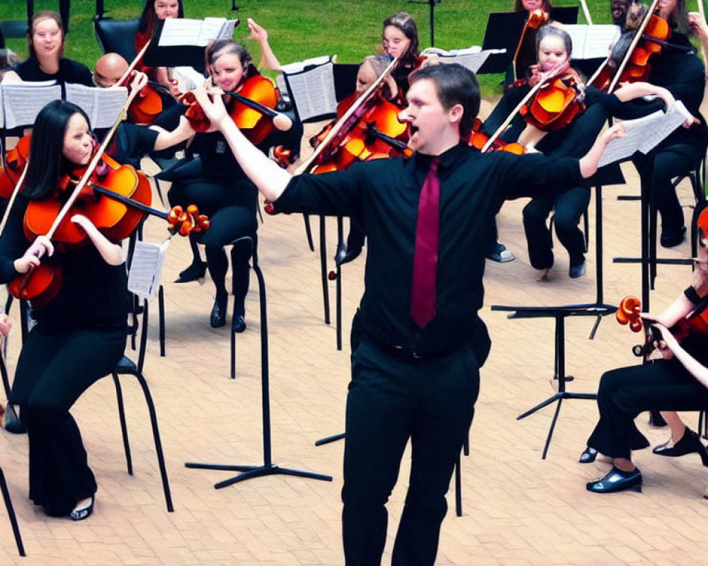 Outdoor orchestra performance by a conductor and violinists