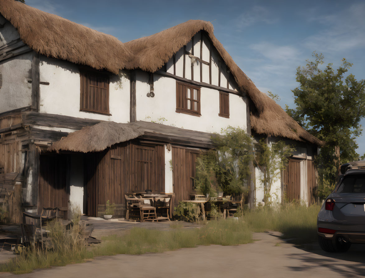 Thatched-Roof Cottage with Timber Frame and Outdoor Seating