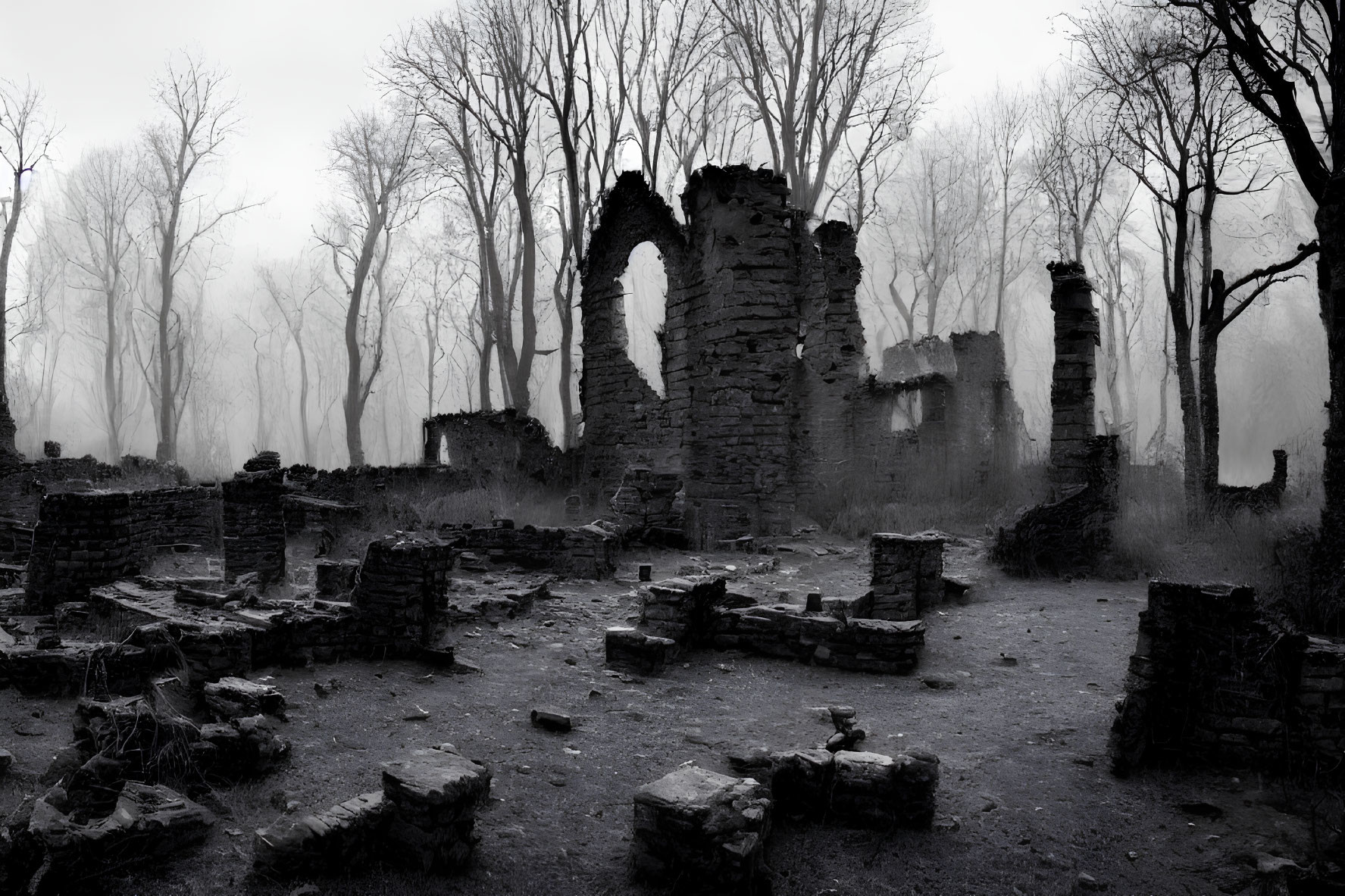 Desolate landscape with ruins and bare trees in fog