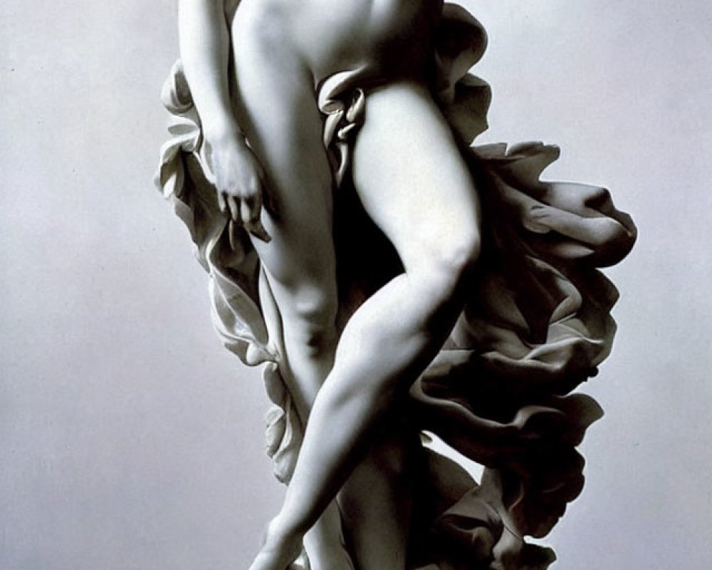 Classical marble statue of a draped female figure on pedestal