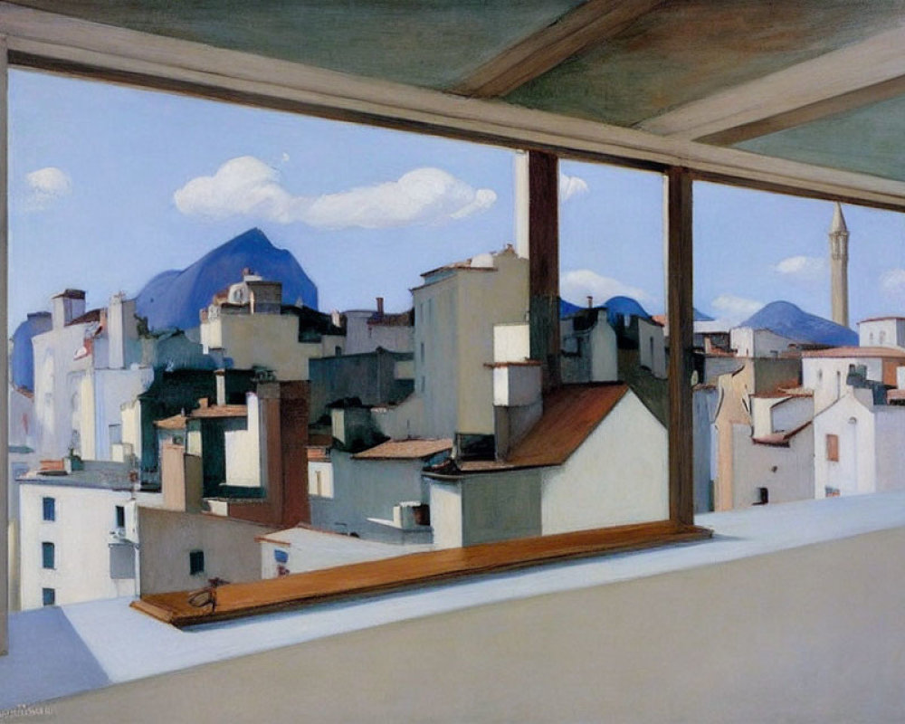 Cityscape viewed through large window with clear sky and mountain in background