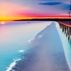 Vivid Pink and Orange Sunset Reflecting on Ocean Pier