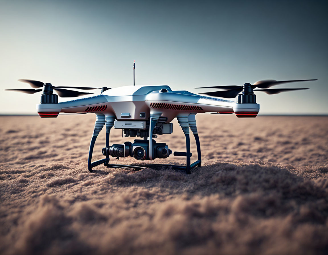 Quadcopter Drone with Camera on Gimbal on Sandy Terrain under Clear Skies