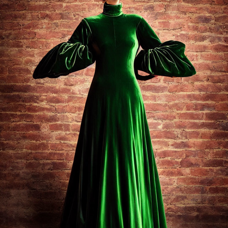 Elegant person in green velvet dress against red brick wall