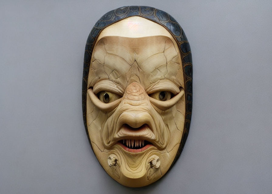 Detailed Angry Mythical Creature Wooden Mask with Inlaid Dark Wood Accents