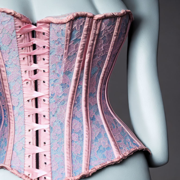 Pink Floral-Patterned Corset with Black Detailing on Mannequin