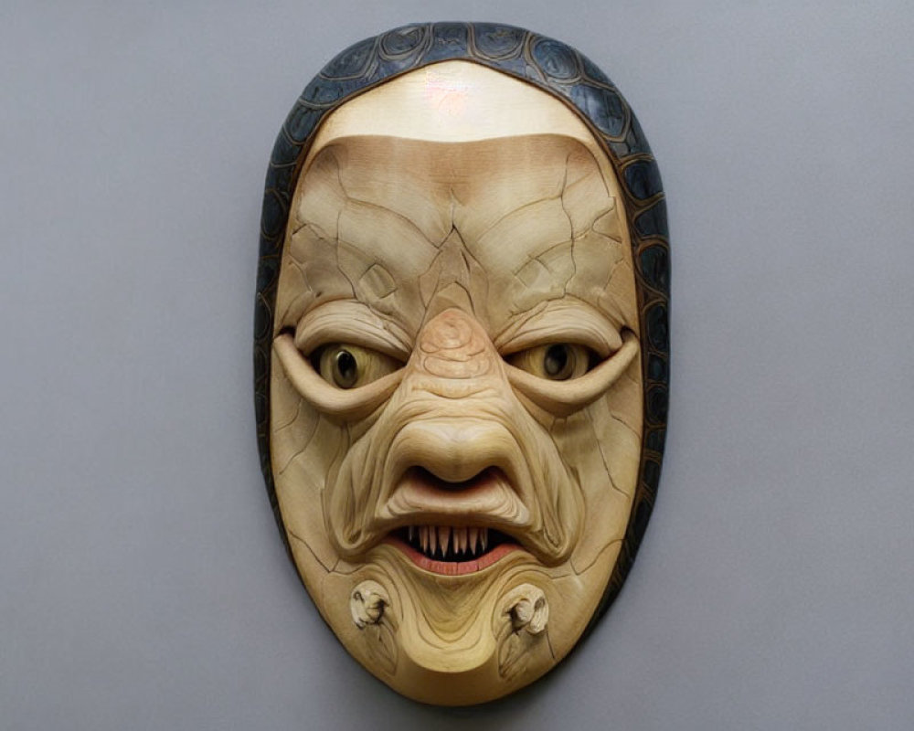 Detailed Angry Mythical Creature Wooden Mask with Inlaid Dark Wood Accents