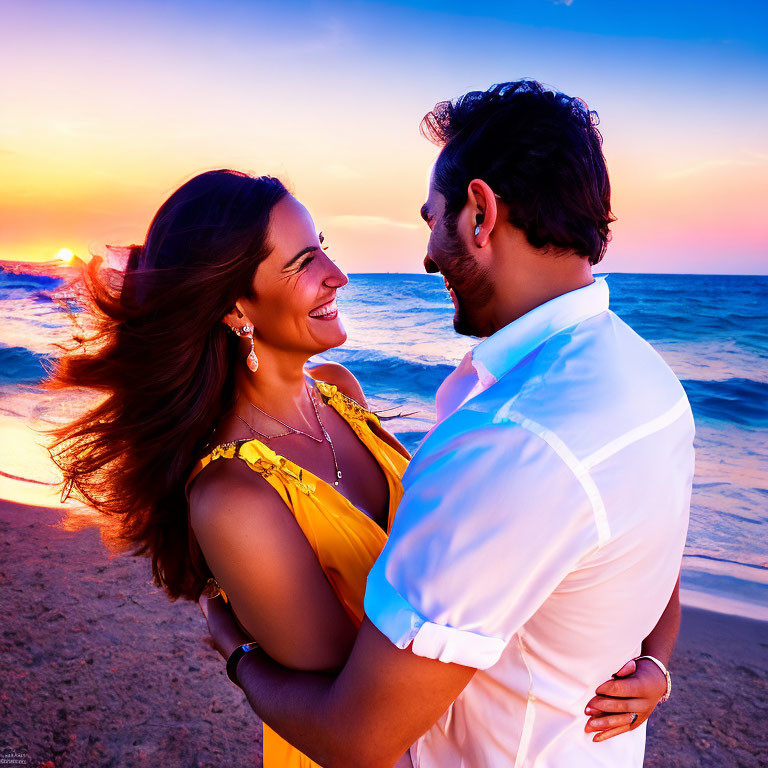 Couple Embracing on Beach at Sunset: Woman in Yellow Dress, Man in White Shirt