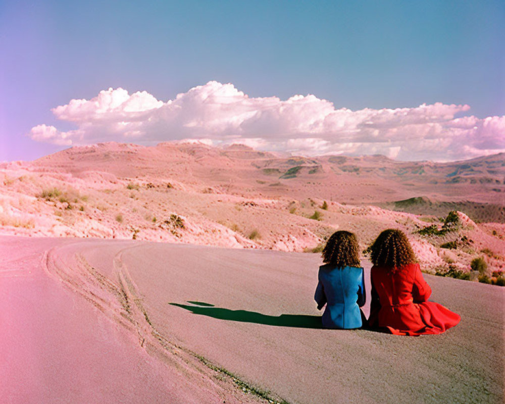 Curly-haired duo on deserted road in scenic landscape