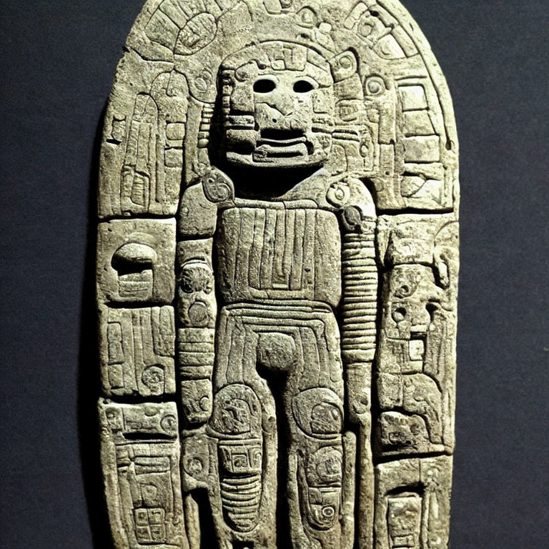 Intricate Ancient Mesoamerican Stone Carving of Deity or Ruler