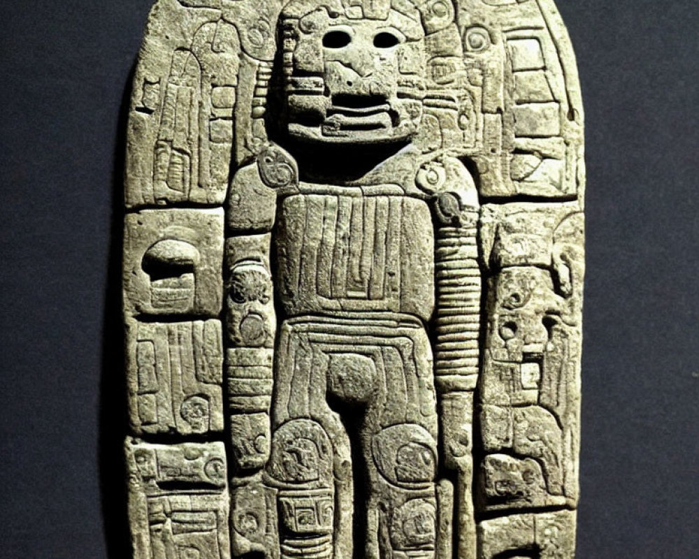 Intricate Ancient Mesoamerican Stone Carving of Deity or Ruler