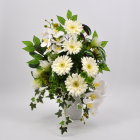 White Flowers and Butterflies in Glass Vase on Pale Background