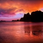 Dramatic Seascape at Sunset with Cliffs and Boats