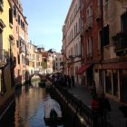 19th-Century Attired People in Van Gogh-Inspired Cobblestone Street