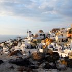 Fantasy landscape with fairytale village perched on rocky outcrops