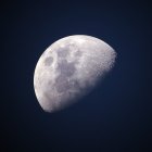Serene Night Landscape with Moon and Cozy House