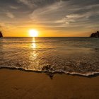 Scenic sunset over river in vibrant countryside