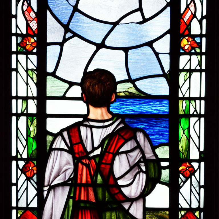 Person in robe gazes at vibrant stained glass window with scenic view.