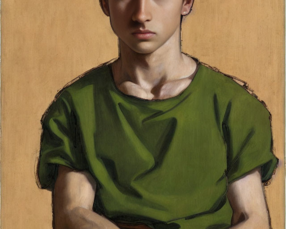 Young Man in Green Tunic Against Beige Background