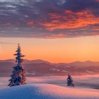 Figure on Hilltop at Sunset with Mountain Silhouette