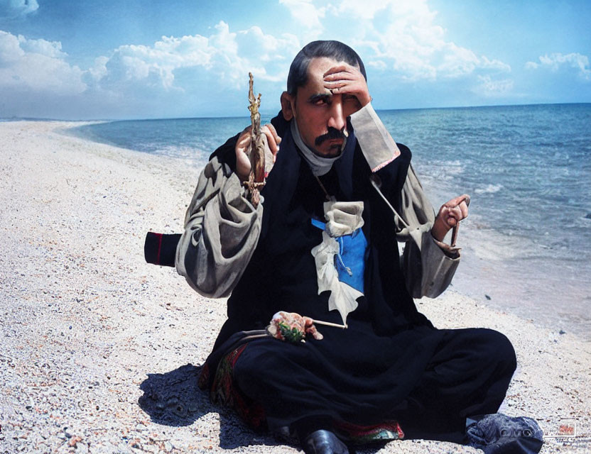 Person in traditional attire gazes into distance on pebble beach with bird on twig